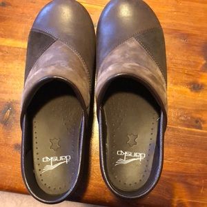 Dansko brown suede and leather women’s clogs.